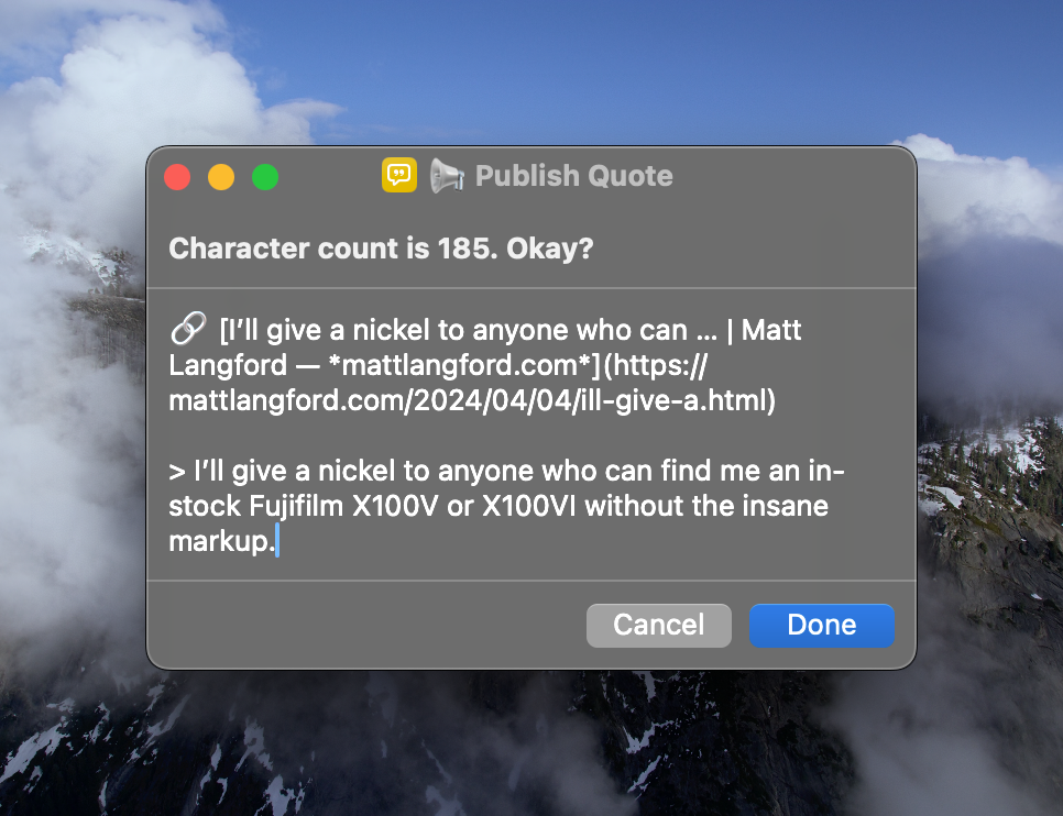 A dialog box with text overlaying a cloudy mountain landscape.