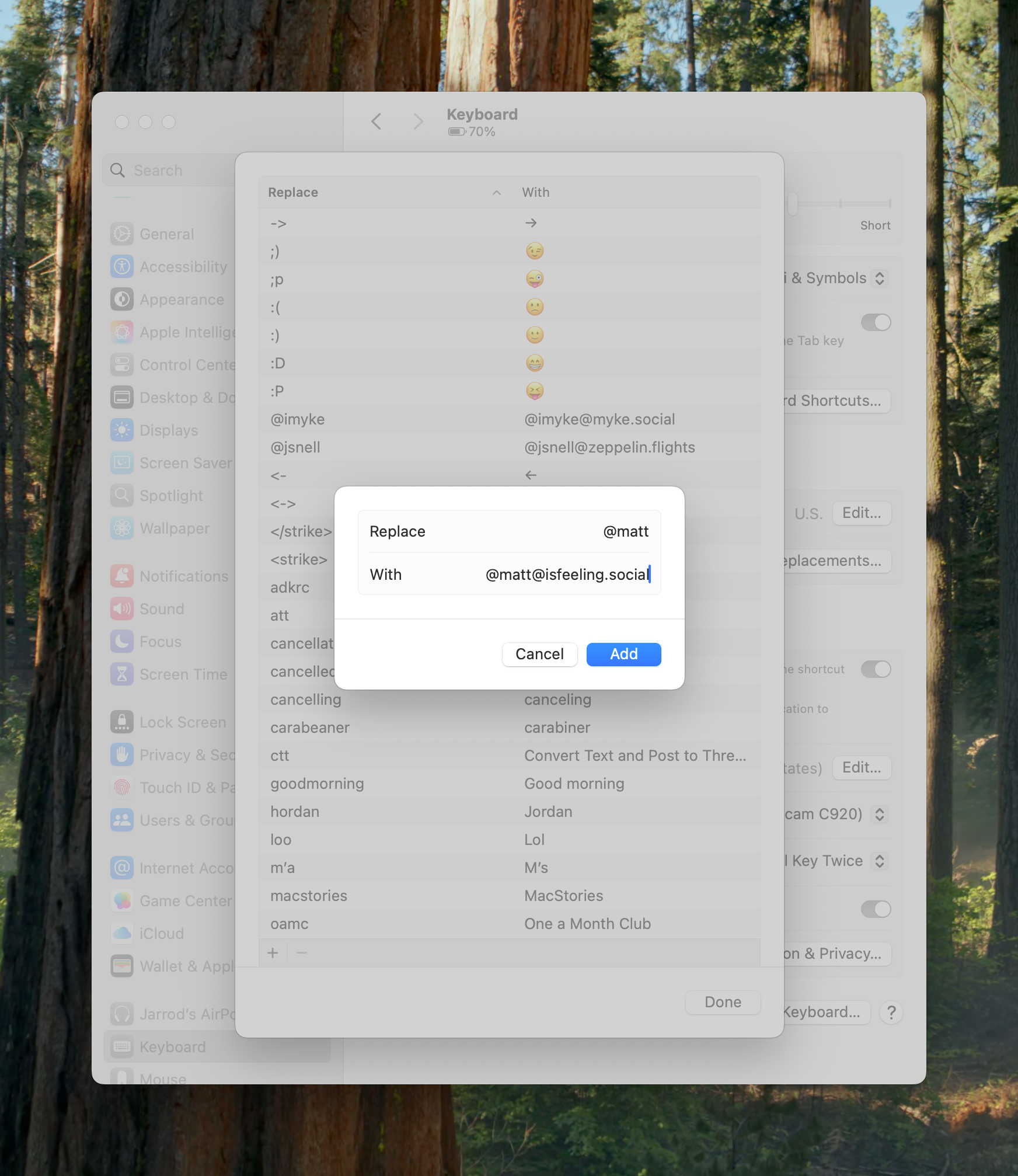 Keyboard settings window displays text replacement list, overlaying a forest background. A smaller pop-up shows replacement entry: "@matt" with "@matt@isfeeling.social". Options include "Cancel" and "Add".