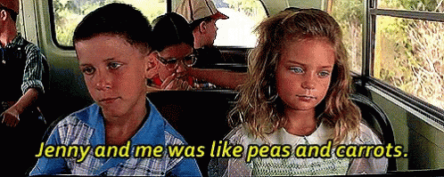 Jenny and Forrest from ‘Forrest Gump’ sit on a school bus; the boy looks at the girl, who stares ahead. Text overlay: “Jenny and me was like peas and carrots.”