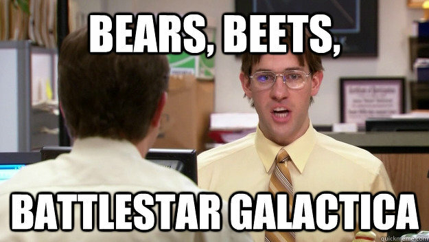 Jim from ‘The Office’ wearing glasses and a yellow shirt is sitting in an office, facing another man with his back to the camera. The text overlay at the top reads “BEARS, BEETS,” and at the bottom reads “BATTLESTAR GALACTICA.”